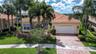 Inviting tropical courtyard entry creating a warm welcome.