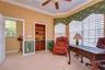 Flexible den ideal for office, fitness room, or third bedroom.