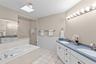 Primary Bath has a Double Vanity, Jetted Tub and Separate Shower