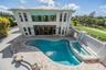 Custom pool and heated Spillover Spa