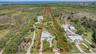 5 Acres with access to canal on right and floating dock at rear