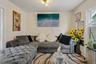 Upper Unit 2 - Cozy Living Area with Window.