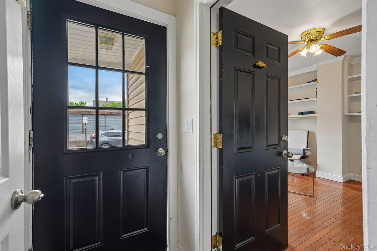 Entry foyer to this 2 family Duplex in a great location...Unit 1 thru the Black door.