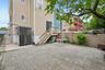 This Good Size Patio has easy access from the lower level back door.