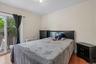 Another view of Primary Bedroom with sliders to back yard.