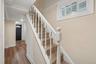 Banister & Stairs from  Main level to Lower level of Unit #1.