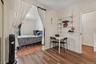 This Bonus room opens to the Primary Bedroom. Laminate floor in Den.