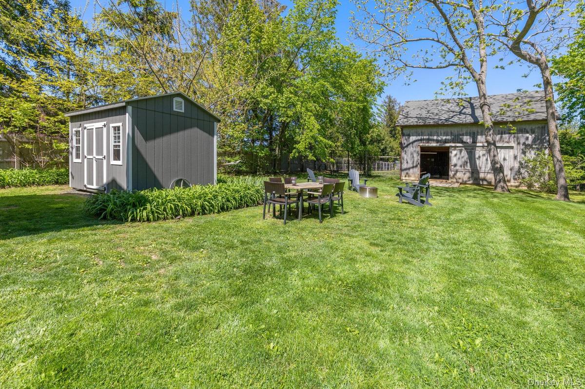 Alfresco Dining.Fire pit with lounging chairs.Functional Barn.Storage Shed.