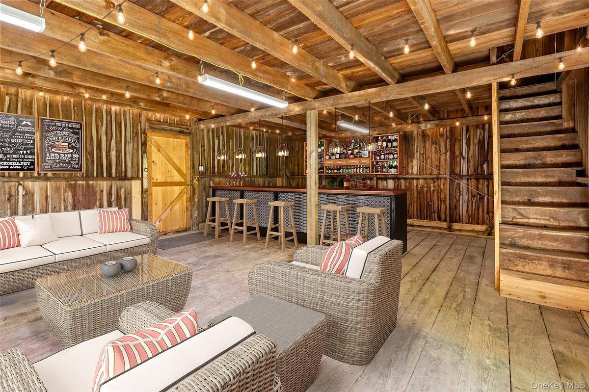 Virtual Staging- great space  for large recreation room, bar, tv, games, etc.!