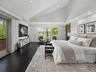 Master Bedroom With Balcony And Waterview