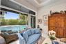 Living room opens up to backyard & pool area. Impact doors slide into each other.