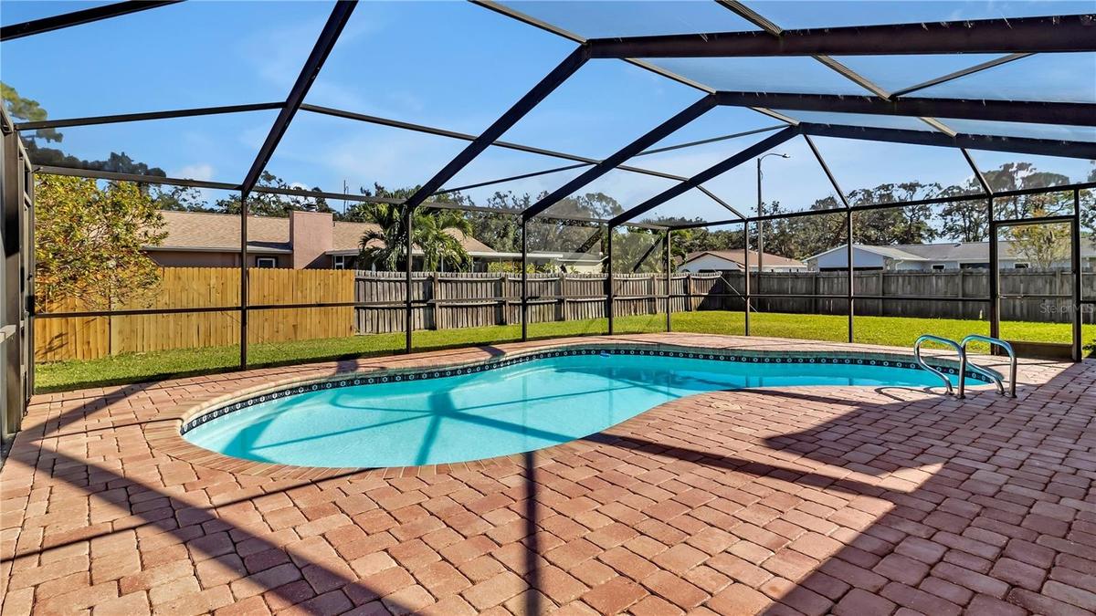 Pool, screened in lanai and large backyard!