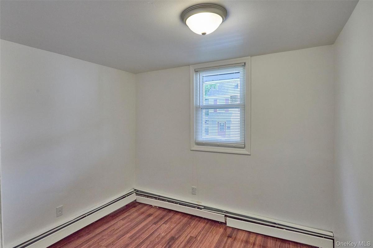2nd bedroom with laminate floor (Unit 1)