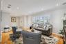 Living Room with wood floors & plantation shutters