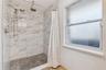 Designer tile-work in the Primary Shower