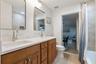 Hall/Guest Bathroom w/ new quartz countertops and mirrors