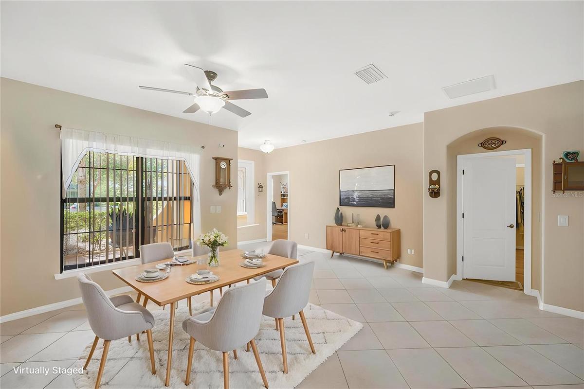 The open floor plan is designed for everyday living and effortless entertaining. Large-format ceramic tile set on a diagonal flows throughout the main