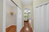 Dual walk-in closets in the primary suite offer exceptional storage space and organization potential.