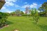 Enjoy your own fruit trees, including a mature avocado tree and a charming kumquat tree, adding both character and fresh homegrown harvests to this ba