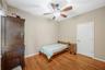 Bedroom # 5 is 12' x 10' and across from the guest bathroom by the family room.