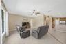 The spacious family room opens to the kitchen, creating a comfortable and inviting space for everyday living and entertaining.