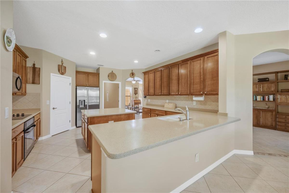 Gourmet kitchen is the heart of this home and sure to impress.