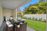 *virtually staged, 1st floor back porch and yard
