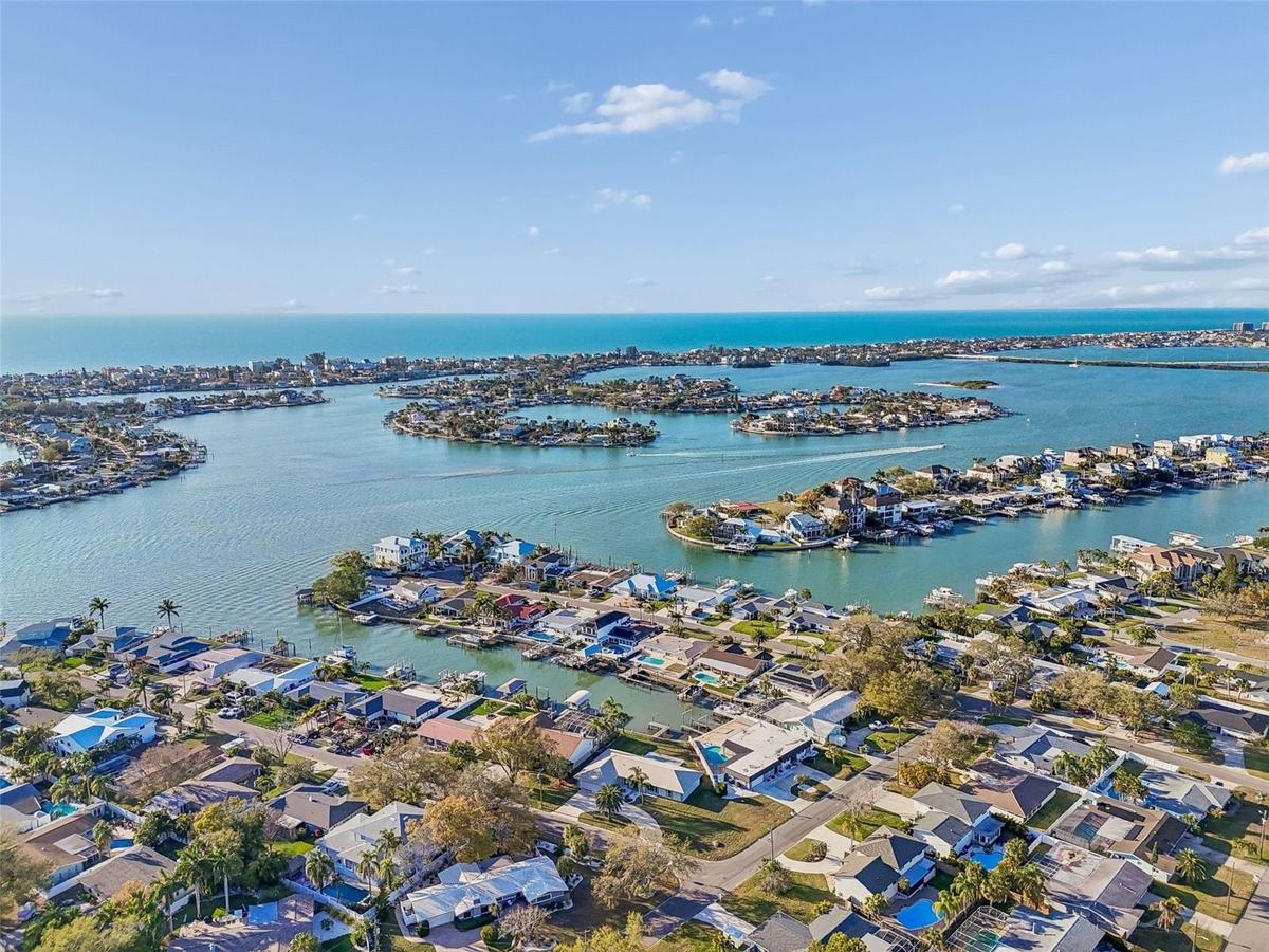 Aerial view looking out over the intracoastal at Indian Rocks Beach and across Gulf Boulevard to the beach!