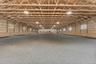 72x160 indoor riding ring connected to the barn with new footing, a new roof and new LED lighting