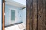 Outside shower with hot and cold water and features a door that goes directly into the Casita half bathroom