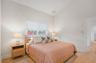 Guest bedroom with vaulted ceilings