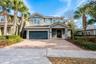Welcome to an EXTRAORDINARY LUXURY RETREAT in the distinguished Reunion West community where elegance, scale, and unforgettable experiences come toget