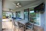 The covered back patio is perfect for dining alfresco and taking in the warm Florida breezes.