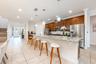 At the heart of the home, the UPDATED Kitchen is both stylish and functional, featuring 42-inch cabinetry, GRANITE COUNTERTOPS, stainless steel applia