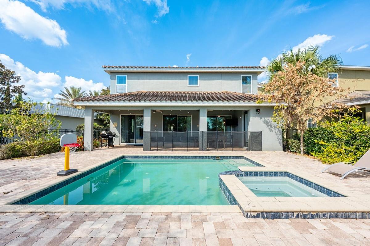 A SPARKLING PRIVATE POOL and SPA await, designed for relaxation and entertainment.
