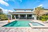 A SPARKLING PRIVATE POOL and SPA await, designed for relaxation and entertainment.