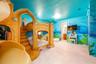 DIVE UNDER THE SEA with Ariel in a stunning ocean-inspired room featuring hand-painted murals, coral accents, and a whimsical sandcastle bed.