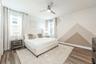 Four of the upstairs bedrooms feature PRIVATE EN SUITE BATHS. Bedroom 4