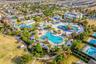 Located within Reunion West, residents and guests enjoy access to an impressive array of RESORT-STYLE AMENITIES, including 24-HOUR GUARD-GATED SECURIT