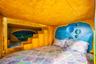 DIVE UNDER THE SEA with Ariel in a stunning ocean-inspired room featuring hand-painted murals, coral accents, and a whimsical sandcastle bed.