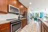 At the heart of the home, the UPDATED Kitchen is both stylish and functional, featuring 42-inch cabinetry, GRANITE COUNTERTOPS, stainless steel applia