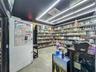 Secure Glass-Enclosed Liquor Inventory Area 1