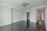 This inviting second bedroom features rich hardwood floors, recessed lighting, and a sleek ceiling fan that adds a touch of modern style. A sliding ba