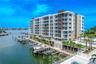 Marina Bay 880 offers breathtaking waterfront views, showcased through expansive floor-to-ceiling windows and sleek glass railings that ensure an unin