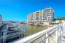 Marina Bay 880 offers breathtaking waterfront views, showcased through expansive floor-to-ceiling windows and sleek glass railings that ensure an unin