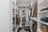 One of Two Walk in Closets in the primary bedroom.