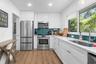 Renovated kitchen/Quartz counters, wood cabinets