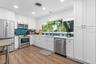 Renovated kitchen/Quartz counters, wood cabinets