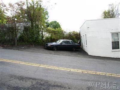 Parking lot of left side of body shop