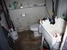 There are 2 Half Baths, this one and one off the office.